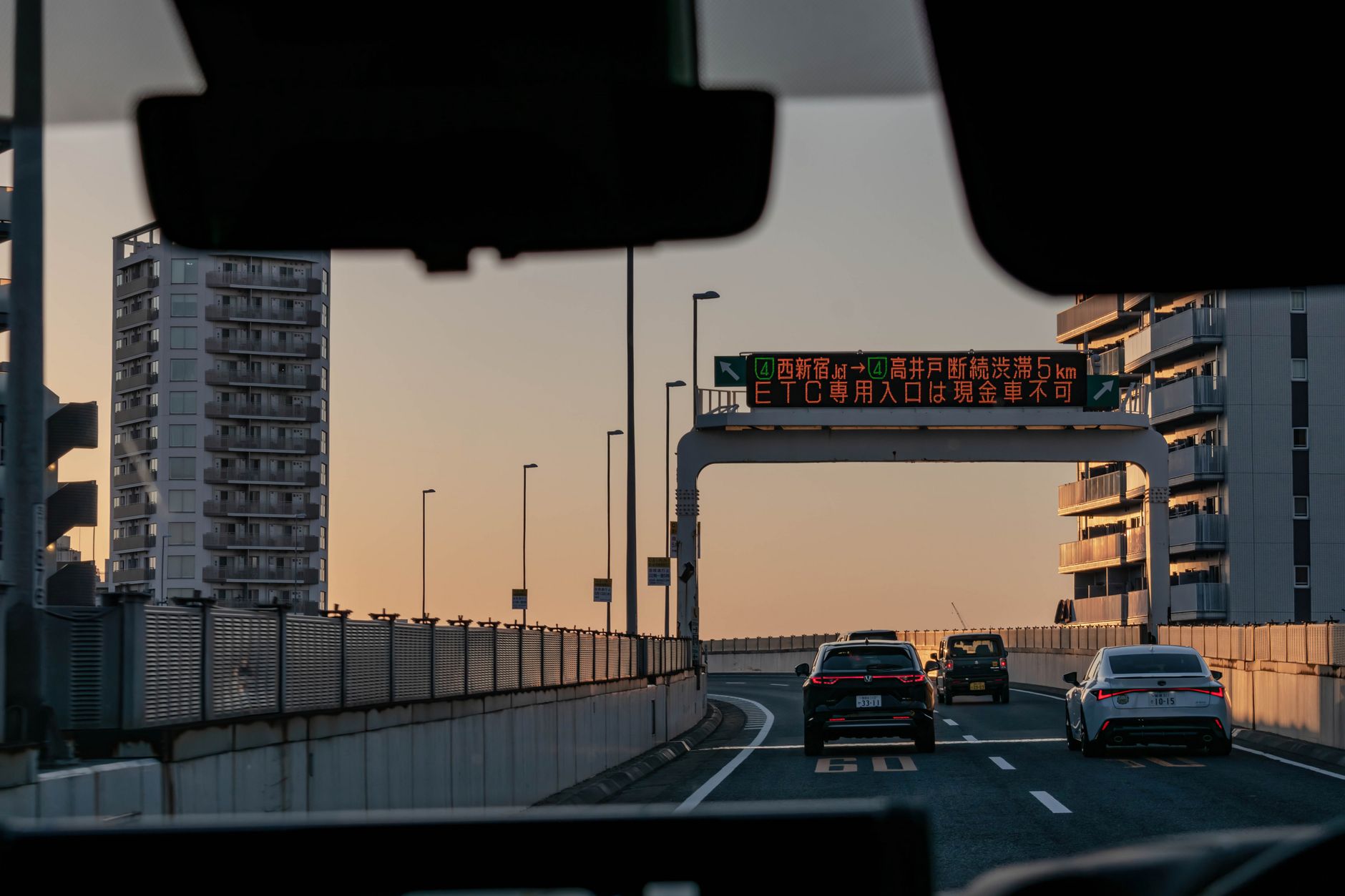 Car traveling on a Tokyo expressway toward the city
