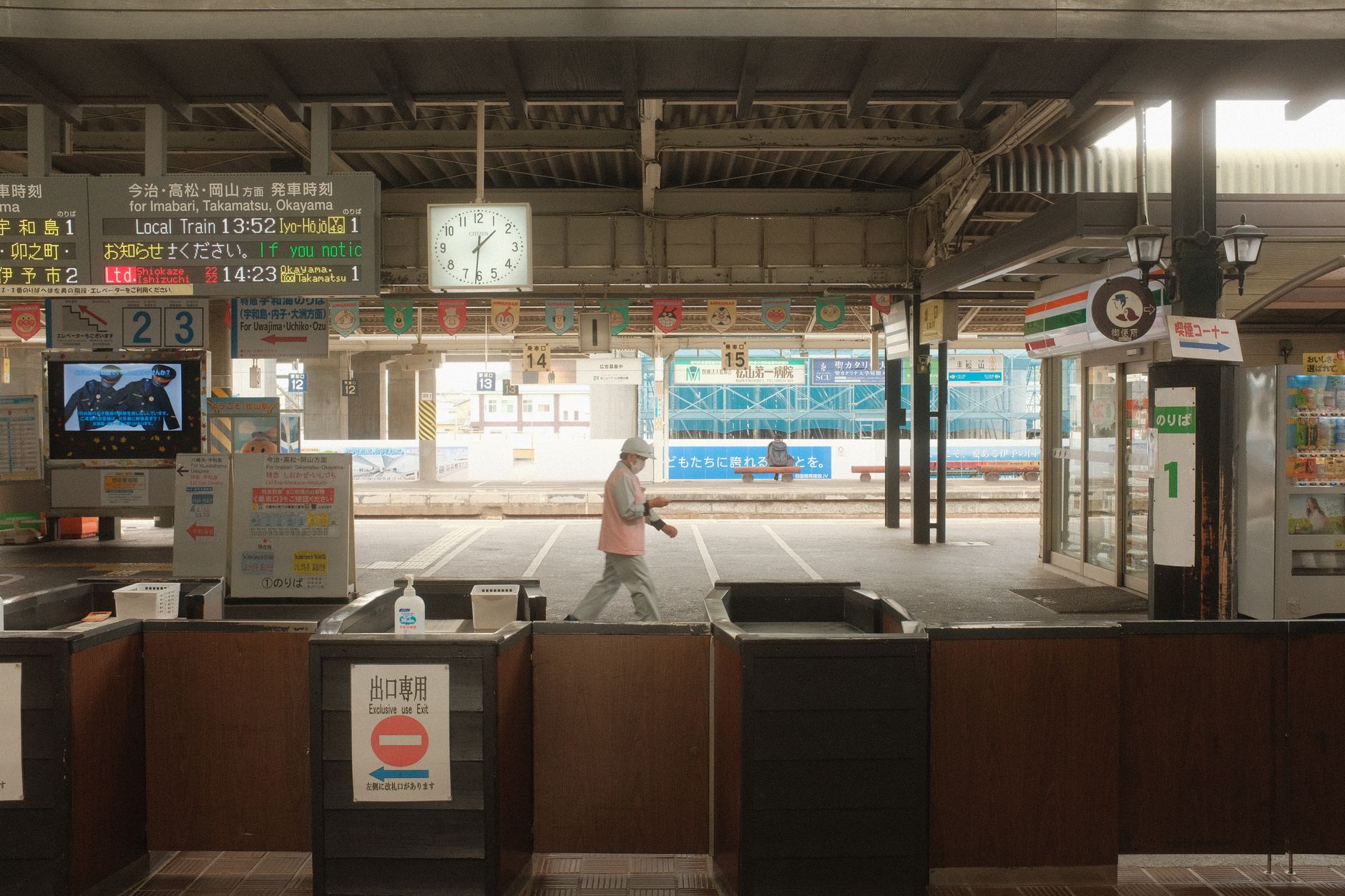 Automatic ticket gates at a railway station in Japan, where travelers tap IC cards such as Suica or PASMO