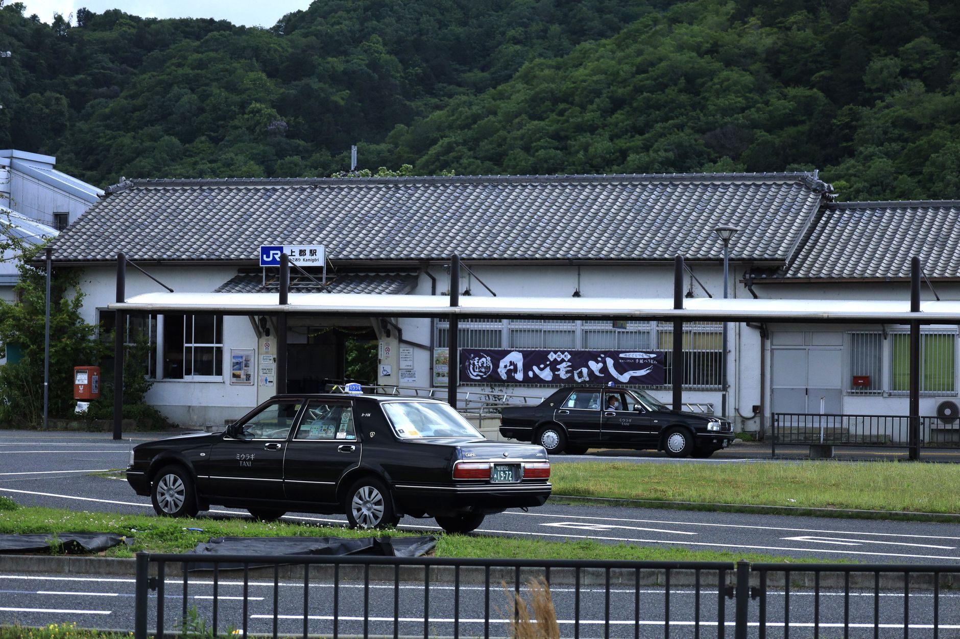 Taxis waiting outside Kamigori Station in Hyogo, Japan