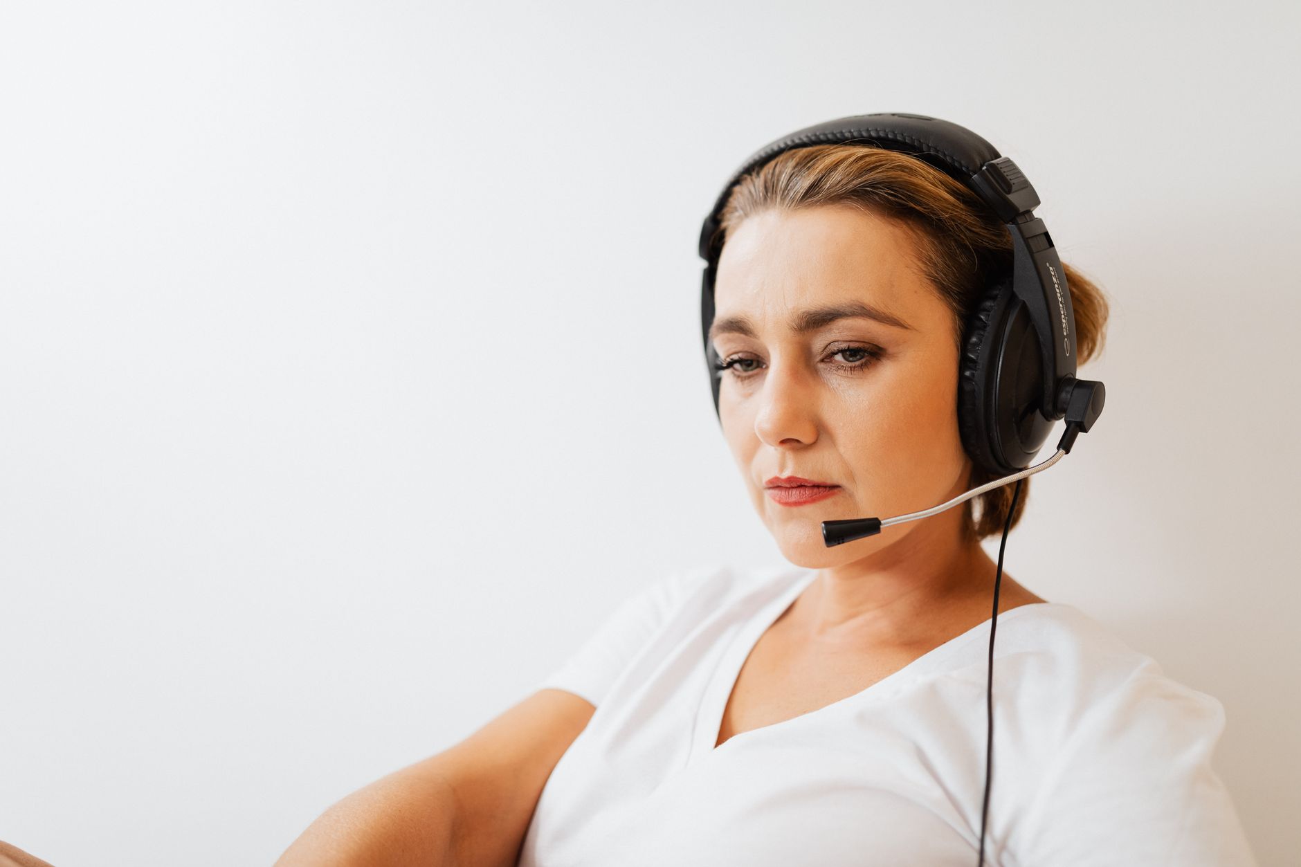 A human customer service representative taking over an escalated conversation